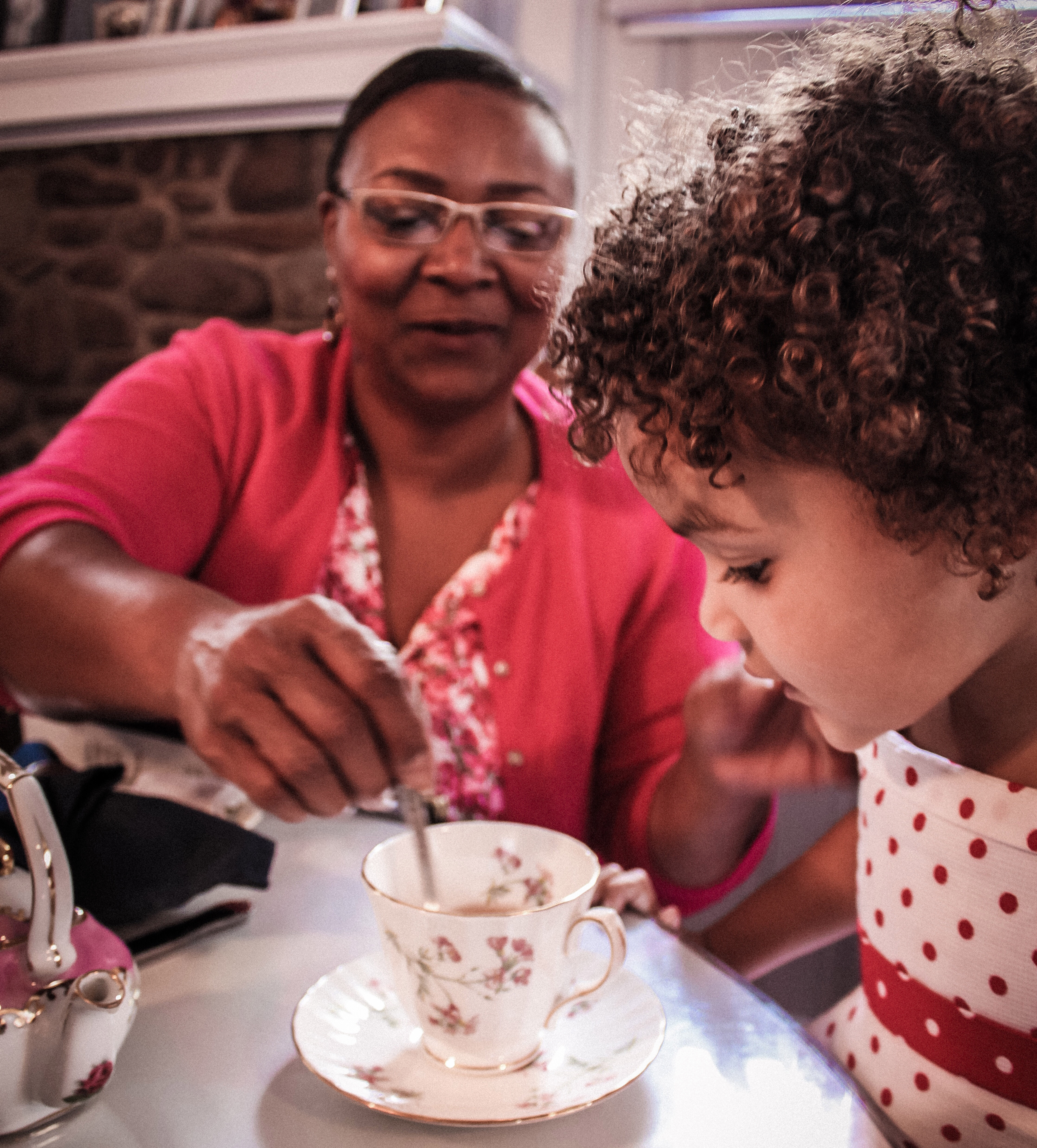 grandma and grandson having a tea-party