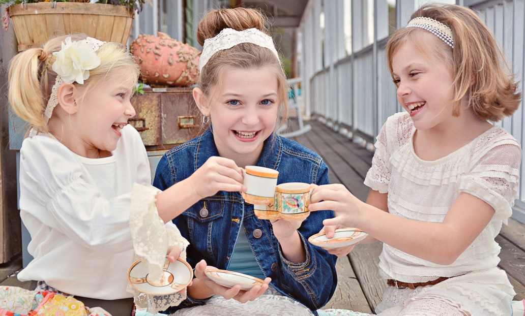 little girls having a tea-party